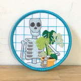 Skeleton and Plant patch